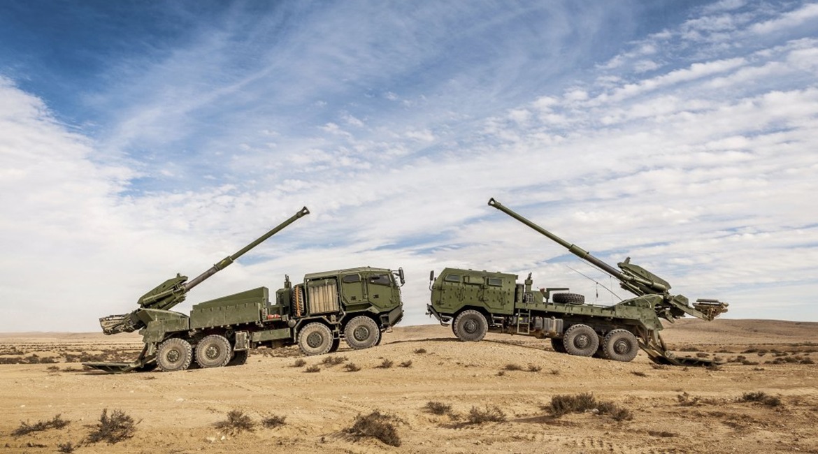 Two versions of the Elbit ATMOS are shown here. The company will also demo its 8×8 version with a semi-automatic loader for the US Army in an upcoming shoot off.