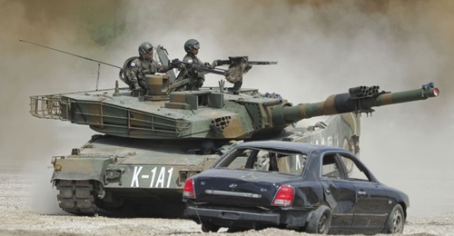 A K1A1 main battle tank seen during a mobility demonstration. South Korean defence prime Hyundai Rotem has been contracted to develop technologies that will enable the K1 platform to be remotely or autonomously operated.