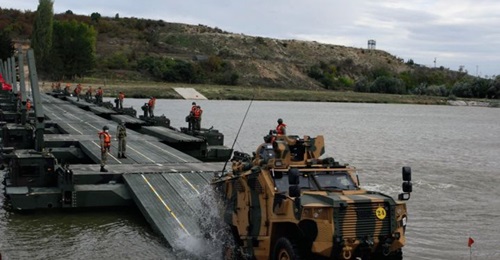 Turkey's 66th Mechanised Infantry Brigade was certified to lead the NRF VJTF in 2021 during exercise 'Anatolian Caracal 2020' in October (photo of Vuran armoured vehicle leaving pontoon bridge).
