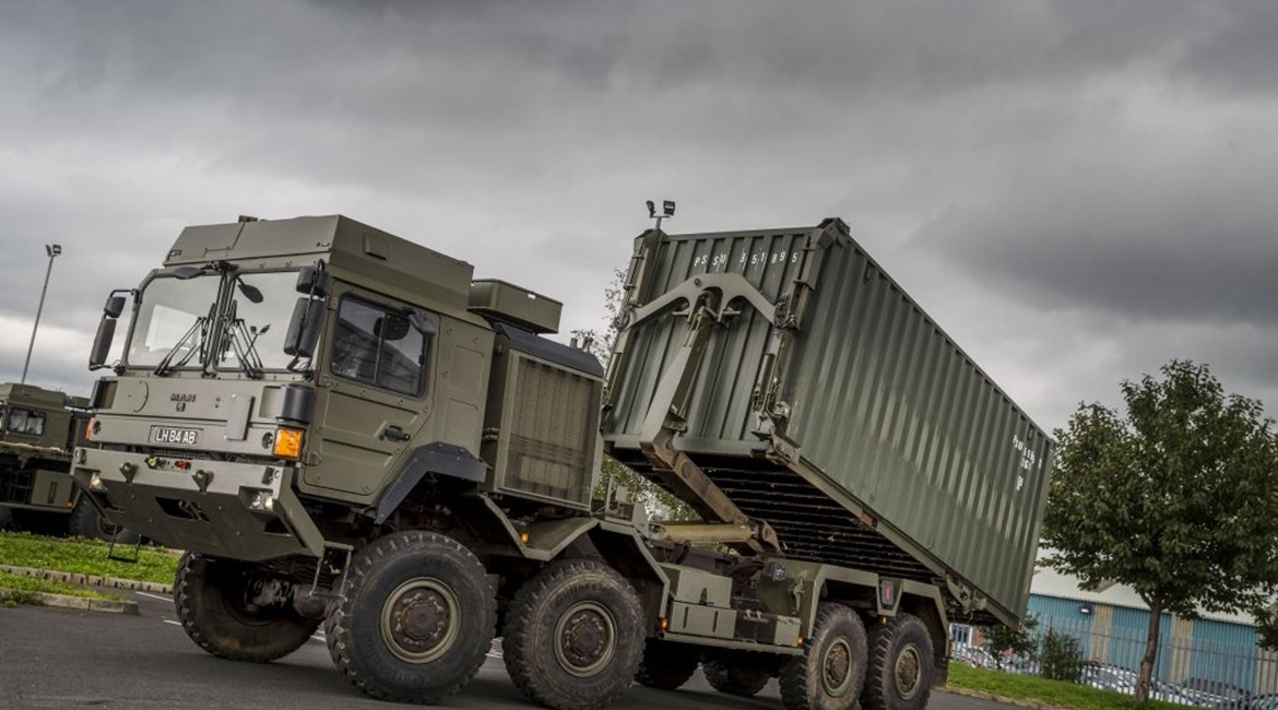 The RMMV HX 8×8 upgraded with an Enhanced Pallet Loading System and carrying a standard 20×8×8 ISO container.