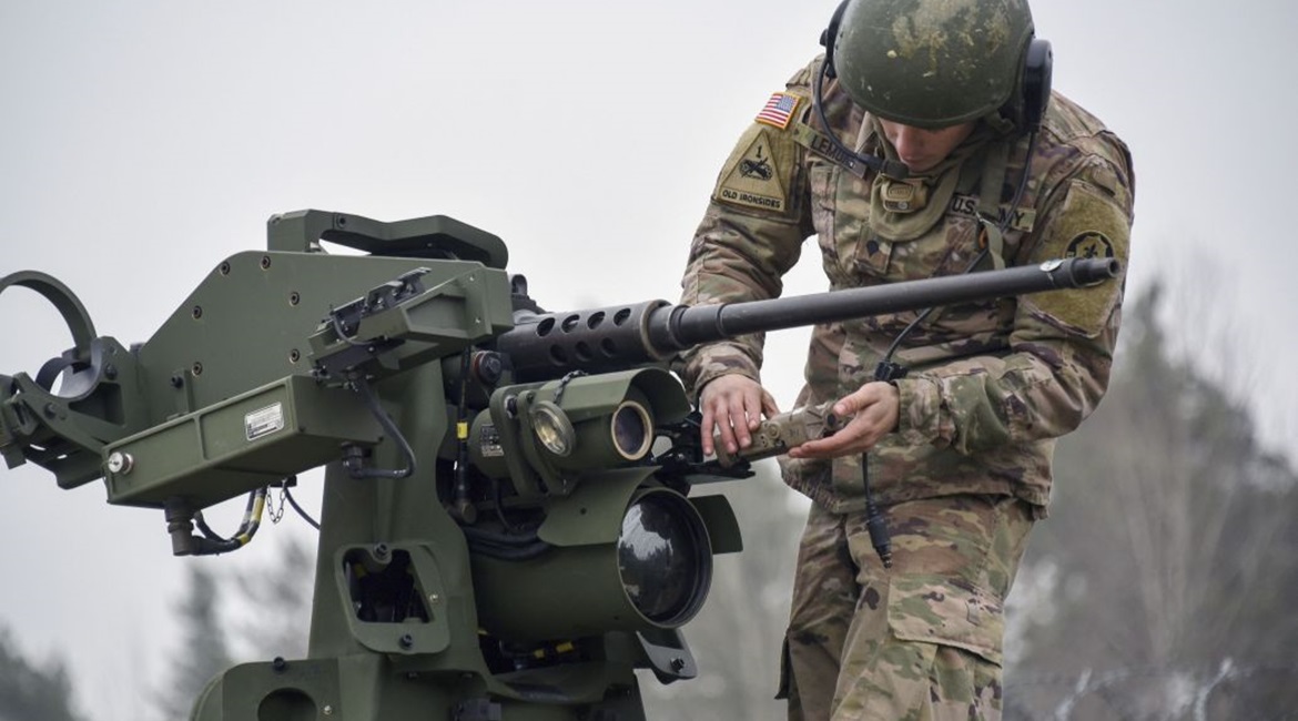 A US soldier assigned to 2nd Cavalry Regiment prepares for a boresight alignment on a CROWS mounted on a Stryker Infantry Carrier Vehicle, in Germany in 2018. The army's CROWS-J Engineering Change Proposal has been delayed due to software problems and ...