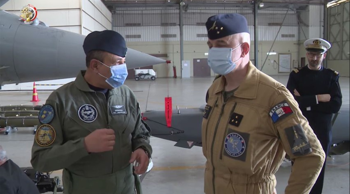 An Egyptian and French officer stand in front of a SCALP cruise missile in a still from the exercise video.