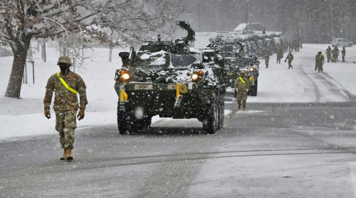 US soldiers assigned to 1st Squadron, 2nd Cavalry Regiment guide Stryker vehicles during railhead operations at Rose Barracks, Vilseck, Germany, in January. The army is working with Lockheed Martin on a MAPS base kit for multiple vehicle fleets.