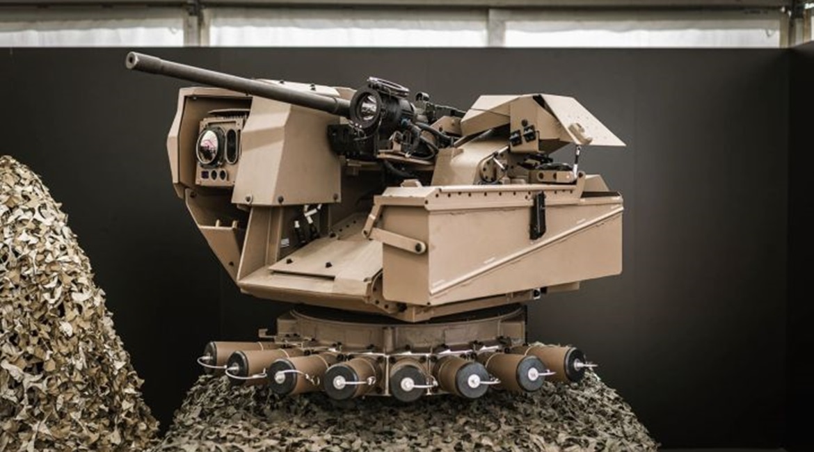 A production standard Hornet RWS armed with a 0.50 calibre M2 HB MG showing the ammunition box left and sensor pod right.