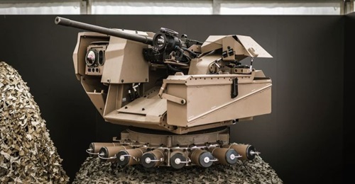 A production standard Hornet RWS armed with a 0.50 calibre M2 HB MG showing the ammunition box left and sensor pod right.