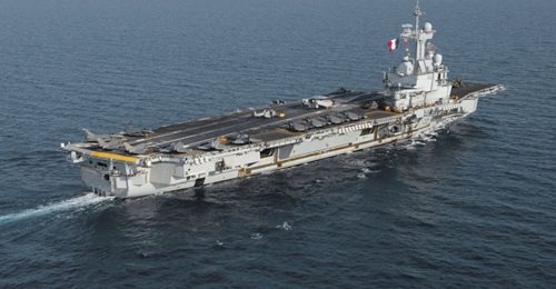 The French Navy's carrier strike group led by the aircraft carrier FS Charles de Gaulle (pictured) will join 'Dynamic Manta' as it transits the exercise area during a pre-deployment work up.