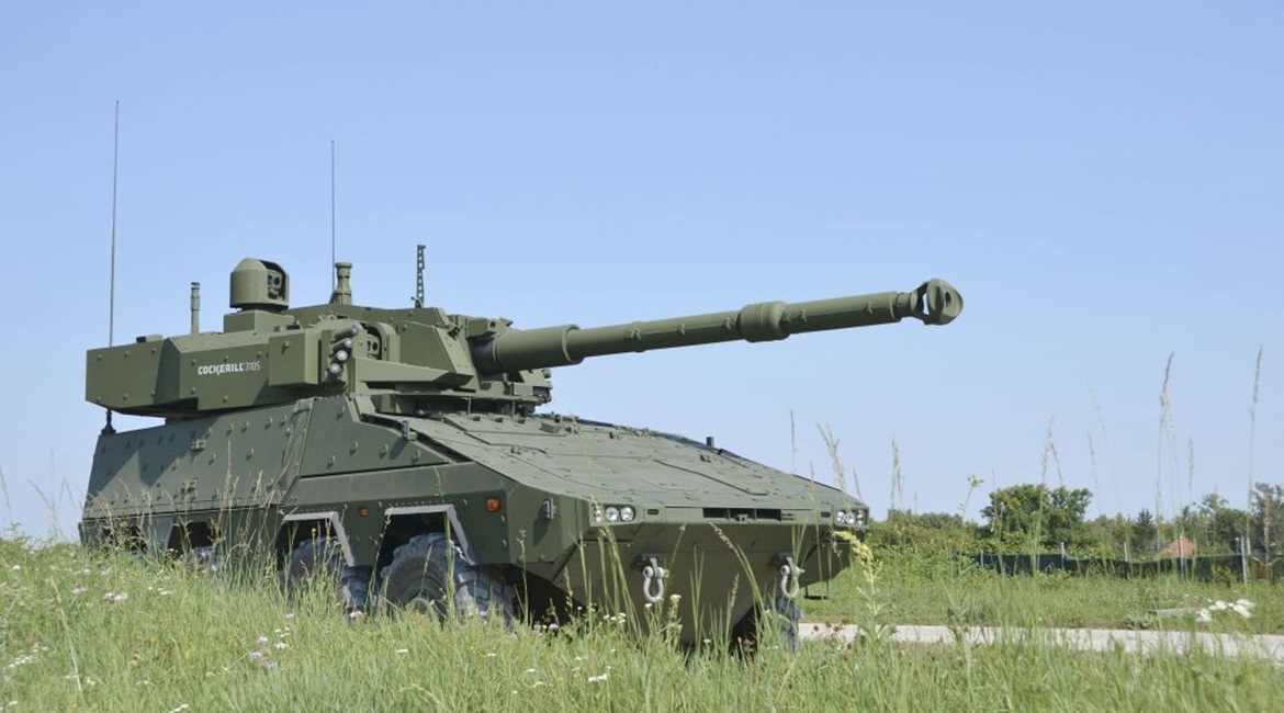 A Boxer MRAV with its rear mission module mounting the John Cockerill Defense C3105, and showing the roof-mounted commander's panoramic sighting system.