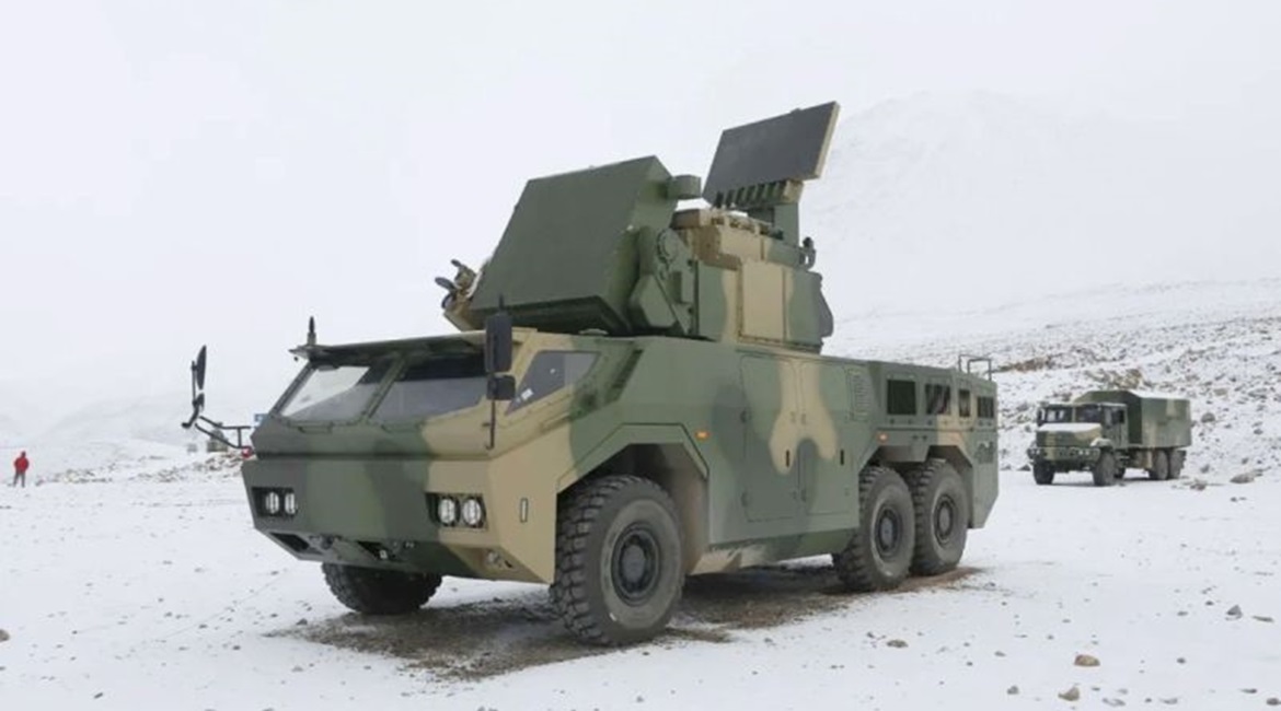 China has cleared the HQ-17AE self-propelled SHORAD system (foreground) for export, according to a 7 March report by the state-owned 
        
         newspaper.