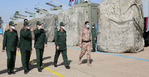 IRGC commander Major General Hossein Salami and IRGN Navy commander Rear Admiral Alireza Tangsiri inspect anti-ship missile launchers.