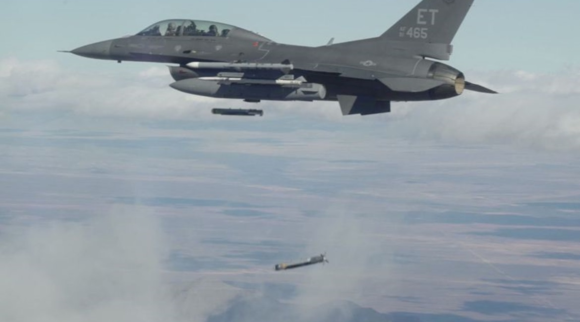 Collaborative Small Diameter Bombs (CSDBs) are launched from the wing of an F-16 fighter from the Air Force Test Center's 96th Test Wing at Eglin Air Force Base, Florida. Four of the bombs were dropped during the second flight demonstration of the Gold...