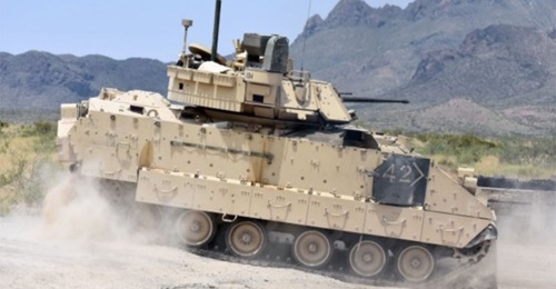 An M2A3 Bradley Fighting Vehicle manoeuvres into position during US Army combat drills in 2018.