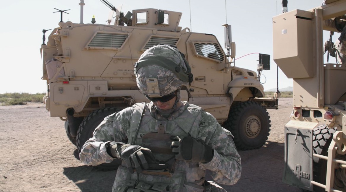 A US soldier operates an Android-based network end-user device during an army network evaluation exercise at White Sands Missile Range, New Mexico.