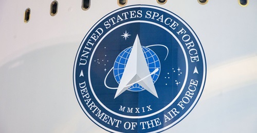 A US Space Force insignia mounted aboard an Advanced Extremely High-Frequency (AEHF-6) satellite testbed.