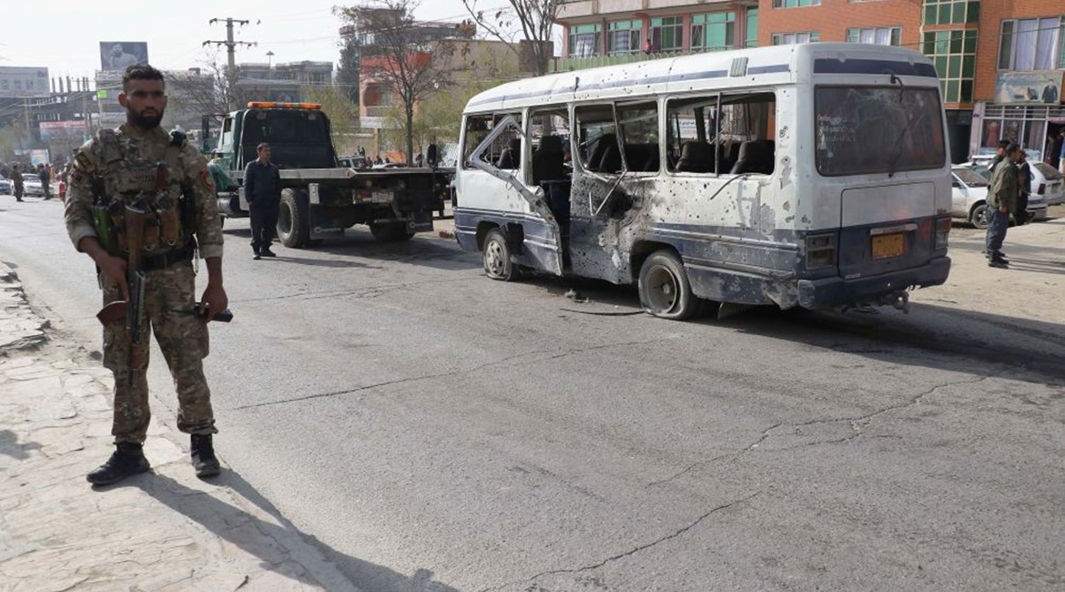 Afghan security officials inspect the scene of a roadside bomb attack that took place on 18 March in Kabul and targeted Afghan government employees. UNAMA said in a 14 April report that the number of civilian casualties in Afghanistan rose by 29% in th...