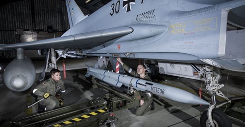 Luftwaffe ground crew load a Meteor BVRAAM aboard a Eurofighter combat aircraft. The service has now begun fielding the missile with the introduction of the P2Eb software on the aircraft.