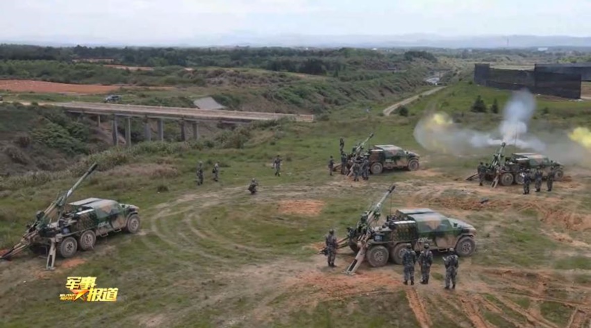 A screengrab from footage released by CCTV on 23 April showing several examples of the PLAGF's new 122 mm 6×6 SPH during a recent live-fire exercise.