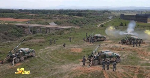 A screengrab from footage released by CCTV on 23 April showing several examples of the PLAGF's new 122 mm 6×6 SPH during a recent live-fire exercise.