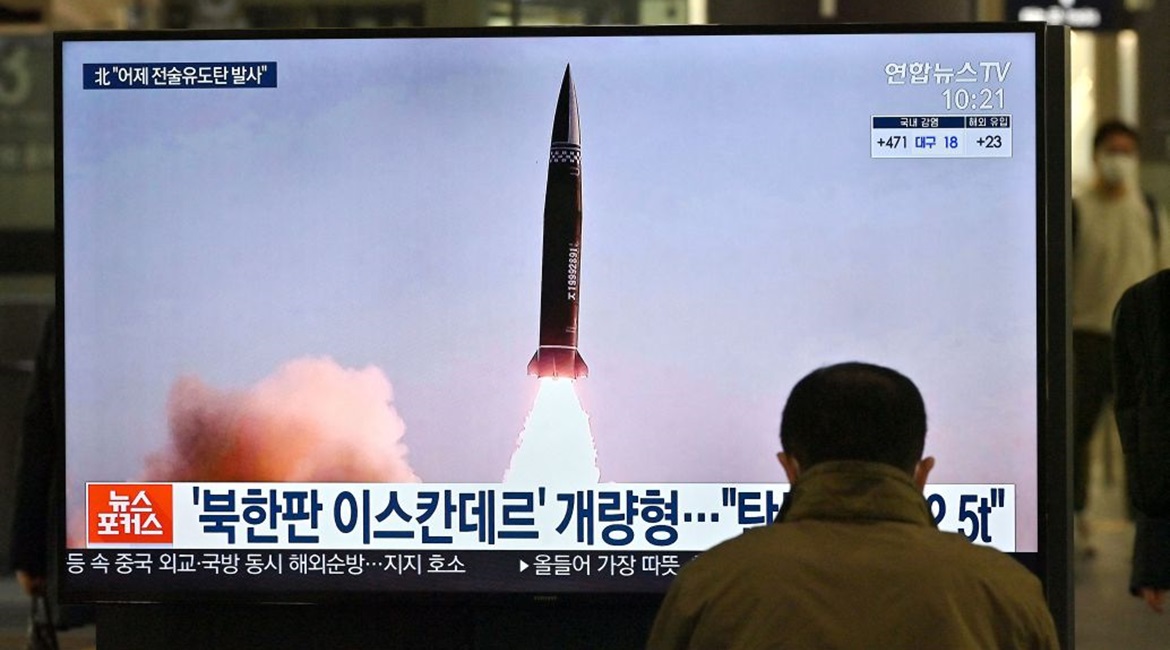 News footage of North Korea's latest SRBM test launch shown on a TV screen at Suseo railway station in Seoul on 26 March. South Korea has revised its assessment of the distance travelled by the two SRBMs test-launched by Pyongyang on 25 March, saying t...