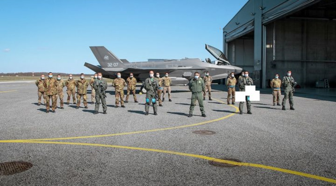 One of the four Italian Air Force F-35As that recently arrived at Amari Air Base in Estonia, alongside some of the service personnel that will conduct the type's first operation in support of the NATO Baltic Air Policing mission.