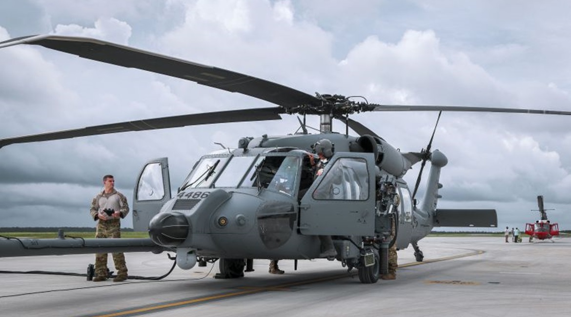 Members of a HH-60W aircrew prepare for a 27 July 2020 flight at Eglin Air Force Base in Florida. Sierra Nevada is protesting the US Air Force's intent to sole-source a contract to HH-60W developer Sikorsky for aircraft upgrades.