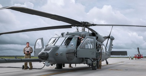 Members of a HH-60W aircrew prepare for a 27 July 2020 flight at Eglin Air Force Base in Florida. Sierra Nevada is protesting the US Air Force's intent to sole-source a contract to HH-60W developer Sikorsky for aircraft upgrades.