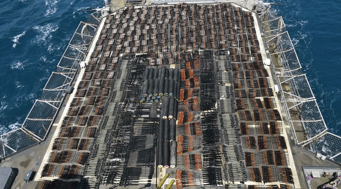 The seized weapons displayed on USS 
        
        's flight deck.